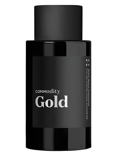 Frasco del perfume Gold de Commodity — fragancia unisex